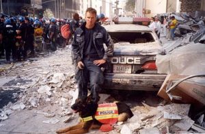 Trakr, a German Shepard, is shown at ground zero with his trainer.