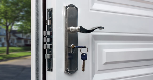 Opened-door-of-a-family-home.-Close-up-of-the-lock-with-your-keys-on-an-armored-front-door.-Security