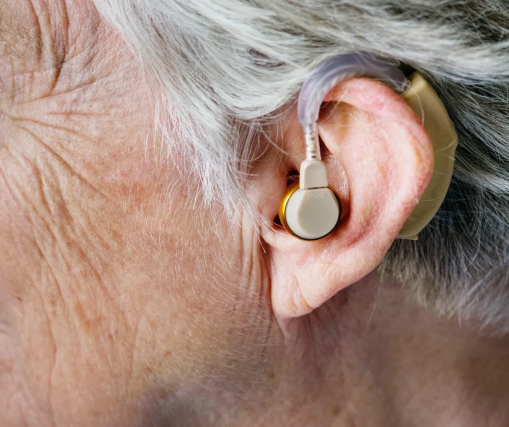 Close up on ear with hearing aid