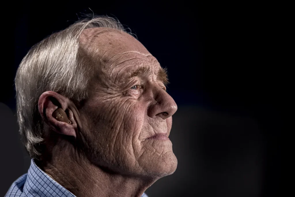 senior man with hearing aid